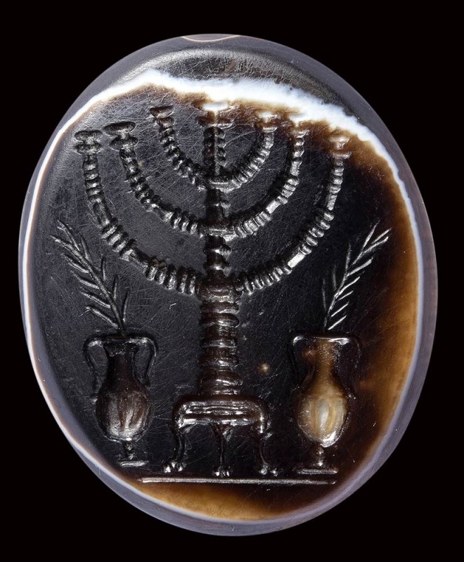 A rare and large roman sardonyx intaglio. Seven-branched menorah. 

1st - 5th ...