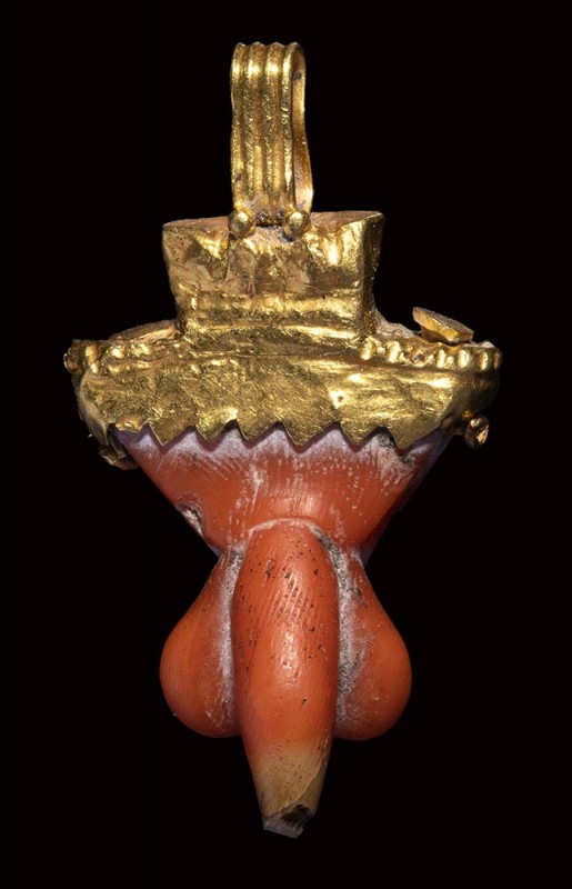 A gold and coral roman apotropaic phallic pendant.

1st century B.C. – 1st cen...