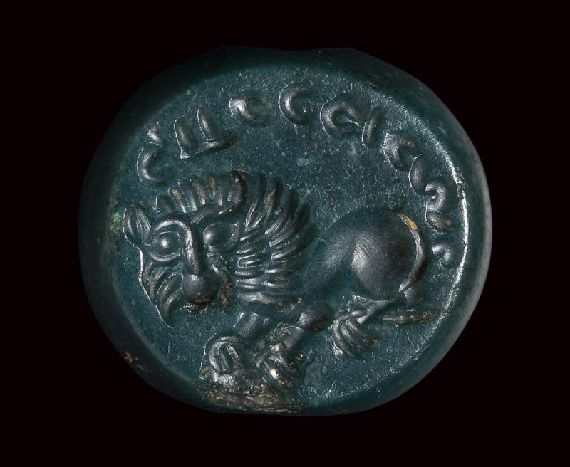 A sasanian green jasper stamp-seal. Lion and inscriptions.

5th century A.D.
...