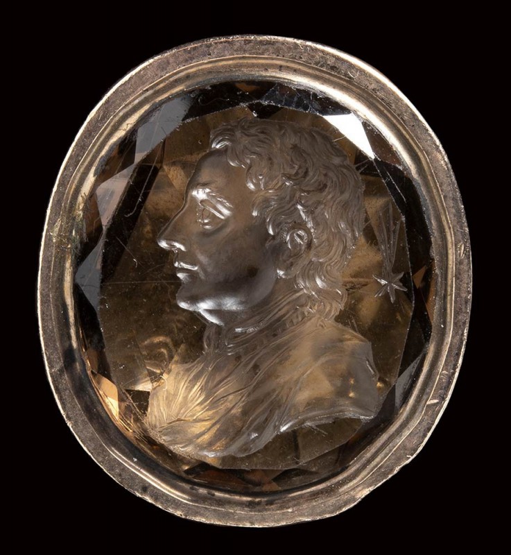 A quartz fumé intaglio set in a metal seal mounting. Portrait of Isaac Newton. ...