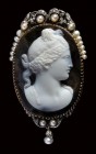A neoclassical  gold, diamonds and  pearls brooch set with an agate cameo signed Pestrini.