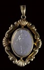 A chalcedony intaglio signed Tonnellier, set in a gold 14K  pendant. Diana hunting.