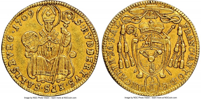 Salzburg. Franz Anton gold 1/2 Ducat 1709 AU58 NGC, KM298, Fr-845. First year of...