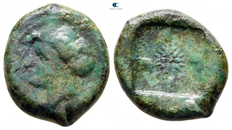Sicily. Syracuse circa 410-405 BC. 
Hemilitron Æ

19 mm., 4,71 g.



near...