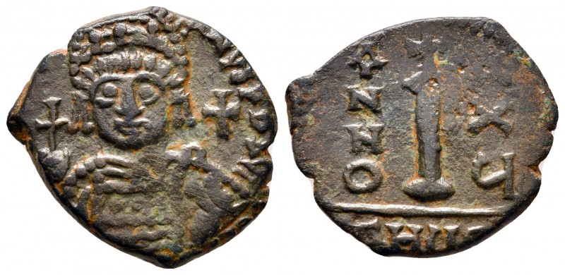 Justinian I AD 527-565. Theoupolis (Antioch)
Decanummium Æ

21 mm., 4,16 g.
...