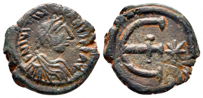 Justinian I AD 527-565. Theoupolis (Antioch)
Pentanummium Æ

15 mm., 2,18 g....