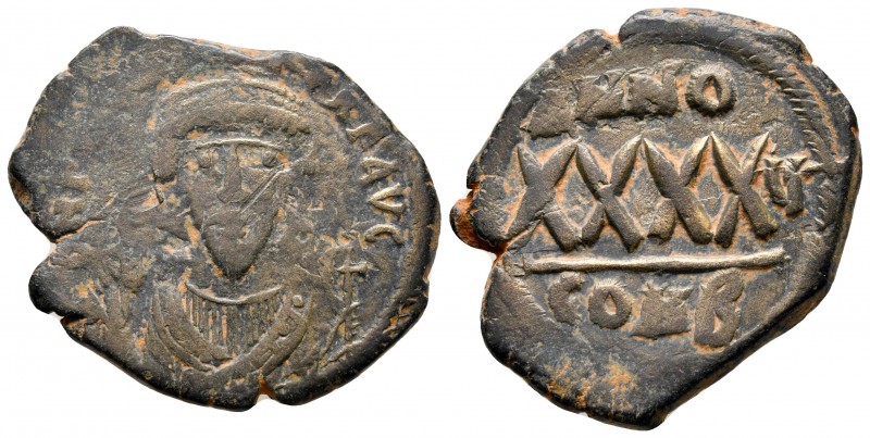 Phocas AD 602-610. Constantinople
Follis or 40 Nummi Æ

30 mm., 9,72 g.


...