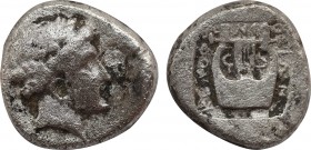 IONIA. Kolophon. Drachm (Circa 450-410 BC).
Obv: Laureate head of Apollo right.
Rev: KOΛOΦΩNION.
Lyre with six strings within incuse square.
Milne, Co...