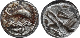 PHOENICIA, Tyre. Circa 435-410 BC.). Obol . Obv: Dolphin right over triple line of waves, murex below; inscription above, 'one-thirtieth' of a mina. R...