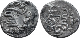 LYDIA. Tralles. Cistophor (Circa 166-67 BC). Ptol-, magistrate. Dated CY 4 (130 BC).
Obv: Cista mystica with serpent; all within ivy wreath.
Rev: TPAΛ...