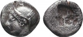 IONIA. Phokaia. Diobol (Circa 521-478 BC).
Obv: Archaic female head left, wearing earring and helmet or close fitting cap.
Rev: Quadripartite incuse s...
