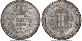 João VI 960 Reis 1820-R AU Details (Cleaned) NGC, Rio de Janeiro mint, KM326.1, LMB-478. Overstruck on an 1817 Chilean Volcano Peso, the mint name bol...