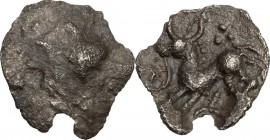 Celtic World. Vindelici. AR 1/4 Quinar, 'Stachelhaar' type, 1st cent BC. Head left. / Horse left; above, pellets. Dembski 470-473; Lanz 20-23. AR. 0.3...