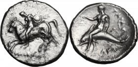 Greek Italy. Southern Apulia, Tarentum. AR Nomos, 302-280 BC. Horseman left, holding round shield. / Phalantos riding on dolphin left, holding wreath....