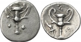 Greek Italy. Southern Apulia, Tarentum. AR Obol, c. 280-228 BC. Kantharos. / Kantharos; to left, torch. HN Italy 1076. AR. 0.55 g. 11.00 mm. VF.