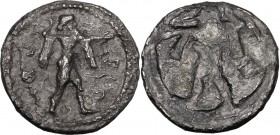 Greek Italy. Northern Lucania, Posidonia. AE Drachm, 530-500 BC. Poseidon, nude but for chlamys draped over shoulders, standing right, preparing to ca...
