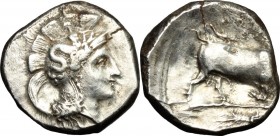 Greek Italy. Southern Lucania, Thurium. AR Stater, c. 300-280 BC. Head of Athena right, wearing crested Attic helmet decorated with Scylla. / Bull but...