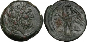 Greek Italy. Bruttium, The Brettii. AE Unit, 211-208 BC. Head of Zeus right, laureate; behind, dagger. / Eagle standing left, head right, wings open; ...