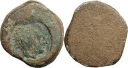 Sicily. AE 26 mm. C/m: Head of Herakles right, wearing lion's skin. AE. 17.20 g. 26.00 mm. Green patina. Host coin worn too much to be classified. F.