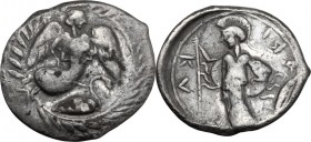 Sicily. Kamarina. AR Litra, 461-440/435 BC. Nike flying right, above swan swimming right, all within laurel wreath. / Athena standing left wearing aeg...
