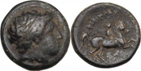 Continental Greece. Kings of Macedon. Philip II (359-336 BC). AE 19 mm. Head of young male right, wearing taenia. / Horseman galloping right; below, m...