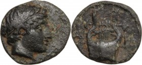 Continental Greece. Cyclades, Delos. AE 9 mm, 308-87 BC. Head of Apollo right. / Kithara. Cf. SNG Cop. 668 (larger coin); HGC 6, 501. AE. 0.46 g. 9.00...