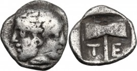 Greek Asia. Troas, Tenedos. AR Obol, 550-470 BC. Janiform head (male and female). / Double axe within incuse square. SNG Cop. 509-510. AR. 0.53 g. 9.0...