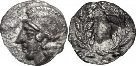 Greek Asia. Aeolis, Elaia. AR Hemiobol, 450-400 BC. Head of Athena left, helmeted. / Wreath. SNG Cop. 164. AR. 0.34 g. 8.00 mm. Lightly toned. VF.