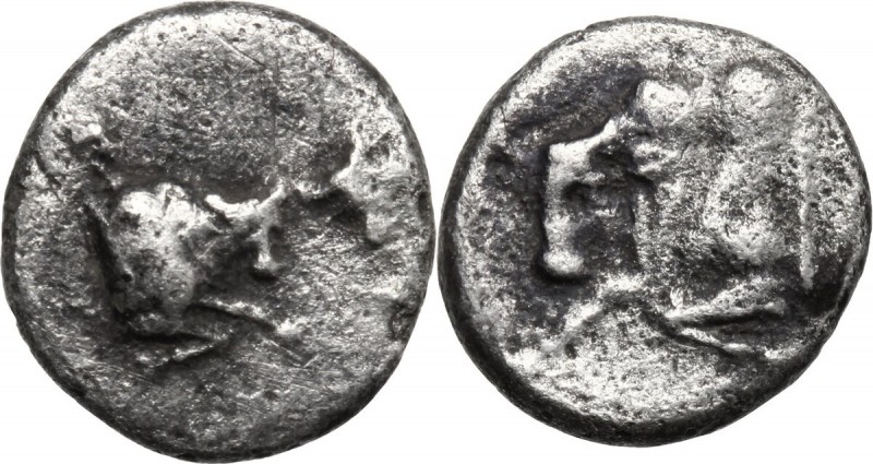 Greek Asia. Caria, uncertain mint. AR Hemiobol, 5th century BC. Foreparts of two...