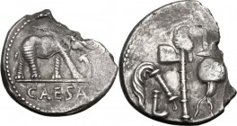 Julius Caesar. AR Denarius, mint moving with Caesar, 49-48 BC. Elephant advancing right, trampling on horned serpent; in exergue, CAESAR. / Pontifical...