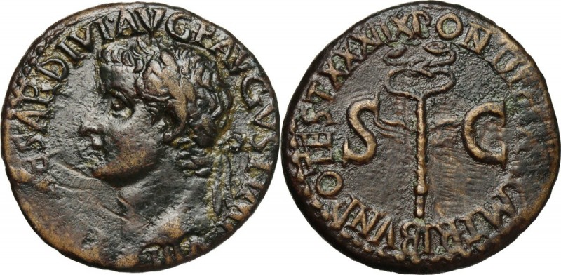 Tiberius (14-37). AE As, 36-37. Head left, laureate. / Winged caduceus flanked b...