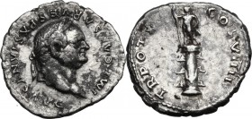 Vespasian (69-79). AR Denarius, 79 AD. Head right, laureate. / Radiate figure standing left on top of rostral column, holding spear and parazonium. RI...