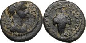 Domitia, wife of Domitian (died 150 AD). AE 14.4 mm. Philadelphia mint, Lydia. ΔOMITI[A AYΓOYCT]A. Draped bust right. / ЄΠI ΛAΓЄTA ΦIΛAΔЄΛΦЄωN. Grape ...