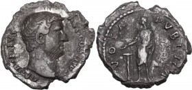 Hadrian (117-138). AR Denarius, 134-138 AD. Bare head right. / Hadrian standing left, sacrificing with patera over tripod. RIC II 290. AR. 2.78 g. 19....