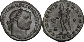 Licinius I (308-324). AE Follis, 309-310, Cyzicus mint. Head right, laureate. / Genius standing left, wearing modius on head and chlamys over left sho...