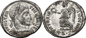 Constantine I (307-337). AE 20 mm, 319 AD, Tessalonica mint. Bust right, laureate, cuirassed. / Victory advancing left, holding wreath and palm. RIC V...