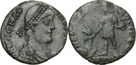 Magnus Maximus (383-388). AE Follis, 383-388, Trier mint. Bust right, diademed, draped, cuirassed. / Emperor standing left, raising kneeling turreted ...