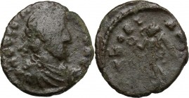 Eugenius (392-394). AE 13 mm. Lugdunum (?) mint. DN EVGEN [...]. Pearl-diademed, draped and cuirassed bust right. / [VI]CTORI-A A[VGGG]. Victory advan...