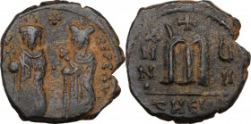 Phocas, with Leontia (602-610). AE Follis. Theoupolis (Antioch) mint. Dated RY 7 (608/9). Phocas, holding globus cruciger, and Leontia, holding crucif...