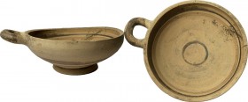 One Handled Daunian Kylix. Daunia, 5th century BC. H. 6.5 cm. Diam. 19.5 cm (including handle).