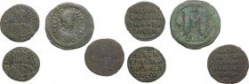 The Byzantine Empire. Multiple lot of 4 unclassified AE Folles; including: Anastasius, Basil I, Leo VI. 5th-9th century. AE. About VF.