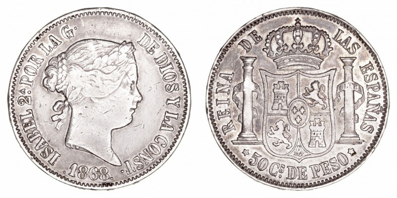 Isabel II
50 Centavos de Peso. AR. Manila. 1868. 12.85g. Cal.667 (2019). Golpec...