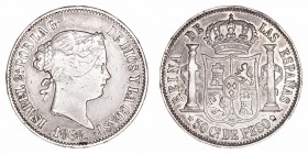 Isabel II
50 Centavos de Peso. AR. Manila. 1868. 12.85g. Cal.667 (2019). Golpecito en canto y suave pátina. (MBC-).
