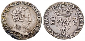 France, Toulouse, Charles IX au nom de Henri II-1560-1574 
Teston
Avers: HENRICVS II D G FRANCO REX Tête du Roi à droite, avec le col cuirassé, la têt...