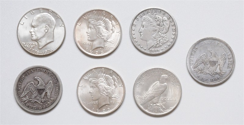 Lot
USA. 7 Stück, ab 1846 diverse Dollar (1 Fälschung). ss - stgl