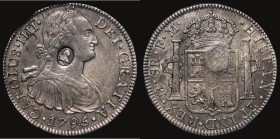 Dollar George III Oval Countermark on a Mexico 8 Reales 1795 FM Mo ESC 129, Bull 1852 Countermark NEF host coin GVF with traces of old lacquering

E...