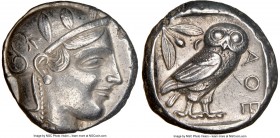 ATTICA. Athens. Ca. 455-440 BC. AR tetradrachm (23mm, 17.13 gm, 10h). NGC Choice XF 5/5 - 5/5. Early transitional issue. Head of Athena right, wearing...