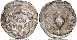 JUDAEA. Bar Kokhba Revolt (AD 132-135). AR zuz (19mm, 2.68 gm, 12h). NGC AU 4/5 - 4/5. overstruck. Undated issue of Year 3 (AD 134/5). Simon (more acc...
