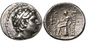 ROYAUME SELEUCIDE, Antiochos III (223-187), AR tétradrachme, 197 av. J.-C., Antioche. D/ T. diad. à d. R/ ΒΑΣΙΛΕΩΣ/ ANTIOXOY Apollon assis à g. sur un...