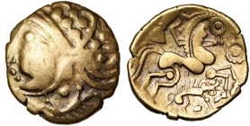 GAULE CELTIQUE, Aulerci Eburovices, AV hémistatère. Type au sanglier. Classe II. D/ T. stylisée à g., la chevelure formée de globules, le nez réduit à...